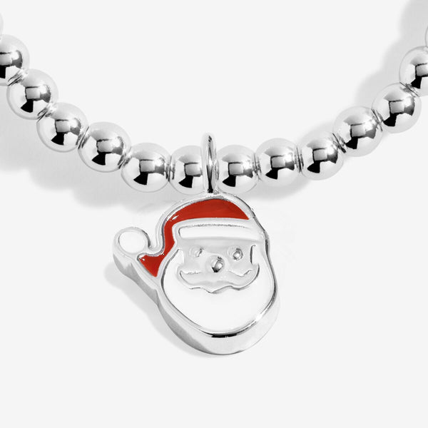 Shop Joma Jewellery’s Kids ‘Love From Santa’ Bracelet. Silver-plated with Santa charm, perfect Christmas gift for kids with gift bag