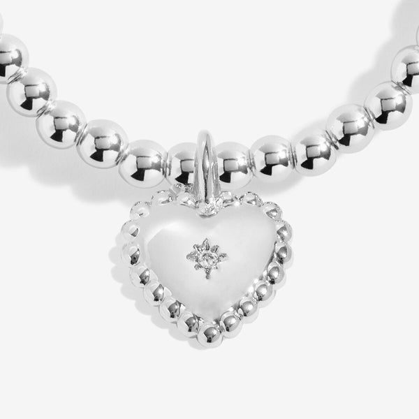 Shop Joma Jewellery’s Kids Love From Santa ‘Merry Christmas Granddaughter’ Bracelet. Silver-plated, heart charm, perfect Christmas gift for young granddaughters with free gift bag