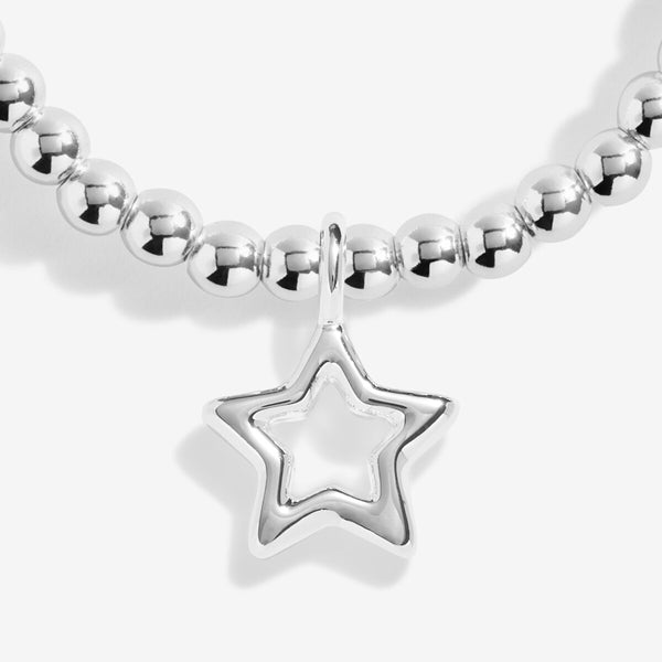 Shop Joma Jewellery’s Kids Stocking ‘A Little Happy Christmas’ Gift Set. Silver-plated bracelet and two sparkling hair clips in a festive stocking, perfect for children’s Christmas gifts