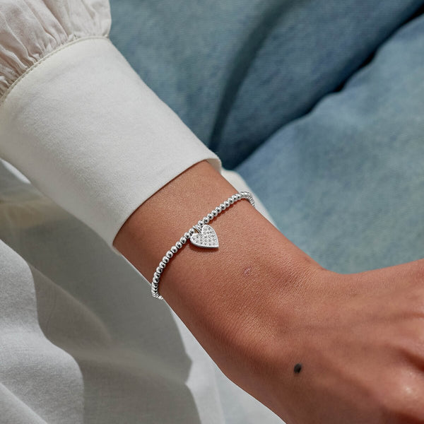 Shop Joma Jewellery’s Christmas A Little ‘Season To Sparkle’ Bracelet. Silver-plated, pavé heart charm, perfect festive gift with free gift bag