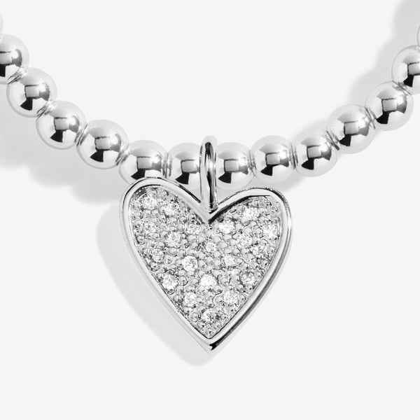 Shop Joma Jewellery’s Christmas A Little ‘Season To Sparkle’ Bracelet. Silver-plated, pavé heart charm, perfect festive gift with free gift bag.