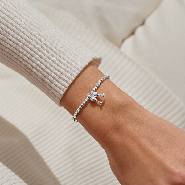 Shop Joma Jewellery’s Christmas A Little ‘Christmas Cheers’ Bracelet. Silver-plated with sparkling champagne flute charm, perfect festive gift with free gift bag