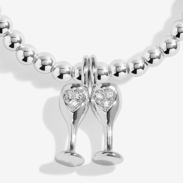Shop Joma Jewellery’s Christmas A Little ‘Christmas Cheers’ Bracelet. Silver-plated with sparkling champagne flute charm, perfect festive gift with free gift bag