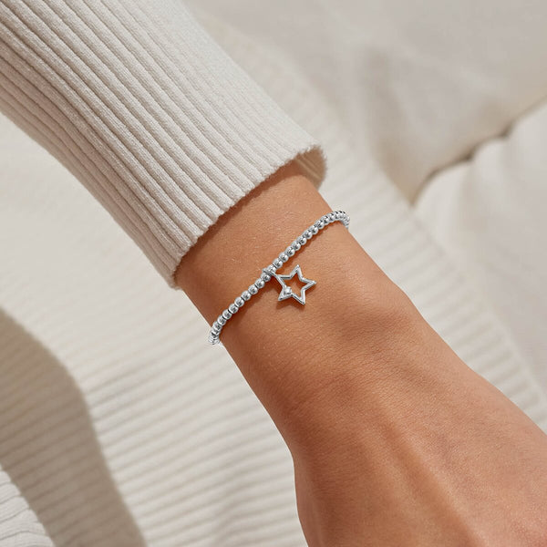 Shop Joma Jewellery’s Christmas A Little ‘Secret Santa’ Bracelet. Silver-plated with a star charm, perfect festive gift or Secret Santa stocking filler with free gift bag