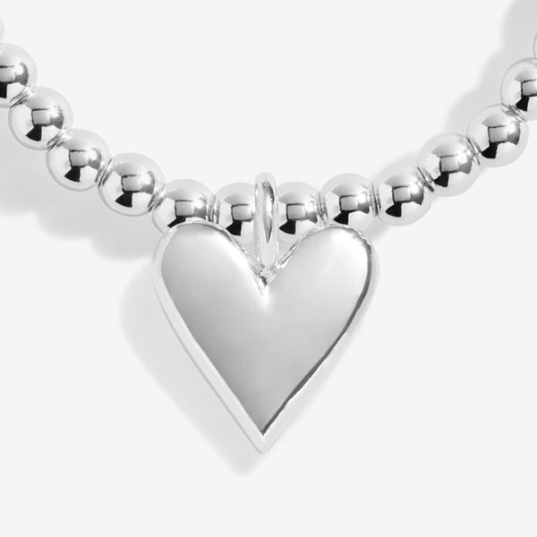 Shop Joma Jewellery’s Adults Stocking ‘A Little Merry Christmas’ Bracelet Gift Set. Silver-plated with heart charm, festive gift ready in a velvet star-print stocking, perfect for Christmas