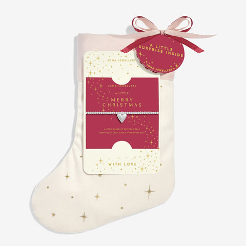 Shop Joma Jewellery’s Adults Stocking ‘A Little Merry Christmas’ Bracelet Gift Set. Silver-plated with heart charm, festive gift ready in a velvet star-print stocking, perfect for Christmas