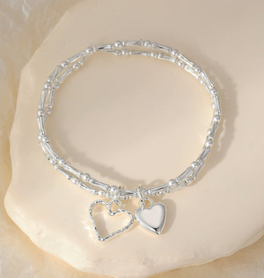 Silver hearts on a double layer stack bracelet with stretch