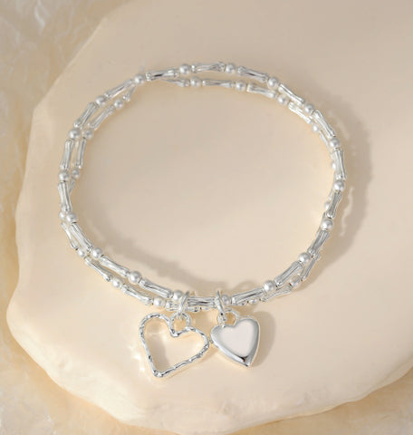 Silver hearts on a double layer stack bracelet with stretch
