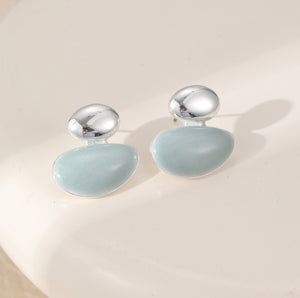 Pair of earrings with silver and light blue on a silver plated stud