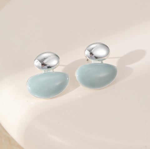 Pair of earrings with silver and light blue on a silver plated stud