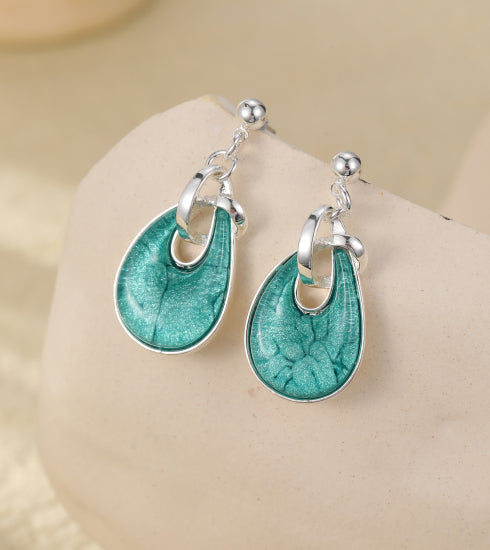 Teal drop earrings on a silver plated drop stud