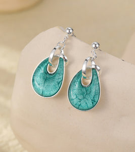 Teal drop earrings on a silver plated drop stud