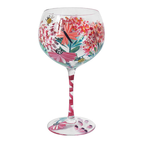 Decorative gin glass with wild garden floral design and striped stem