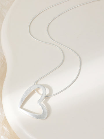 Heart-shaped silver plated pendant on an adjustable chain