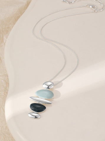 Silver plated necklace with a unique blue tone pendant