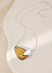 Silver plated necklace with an amber pendant on an adjustable chain